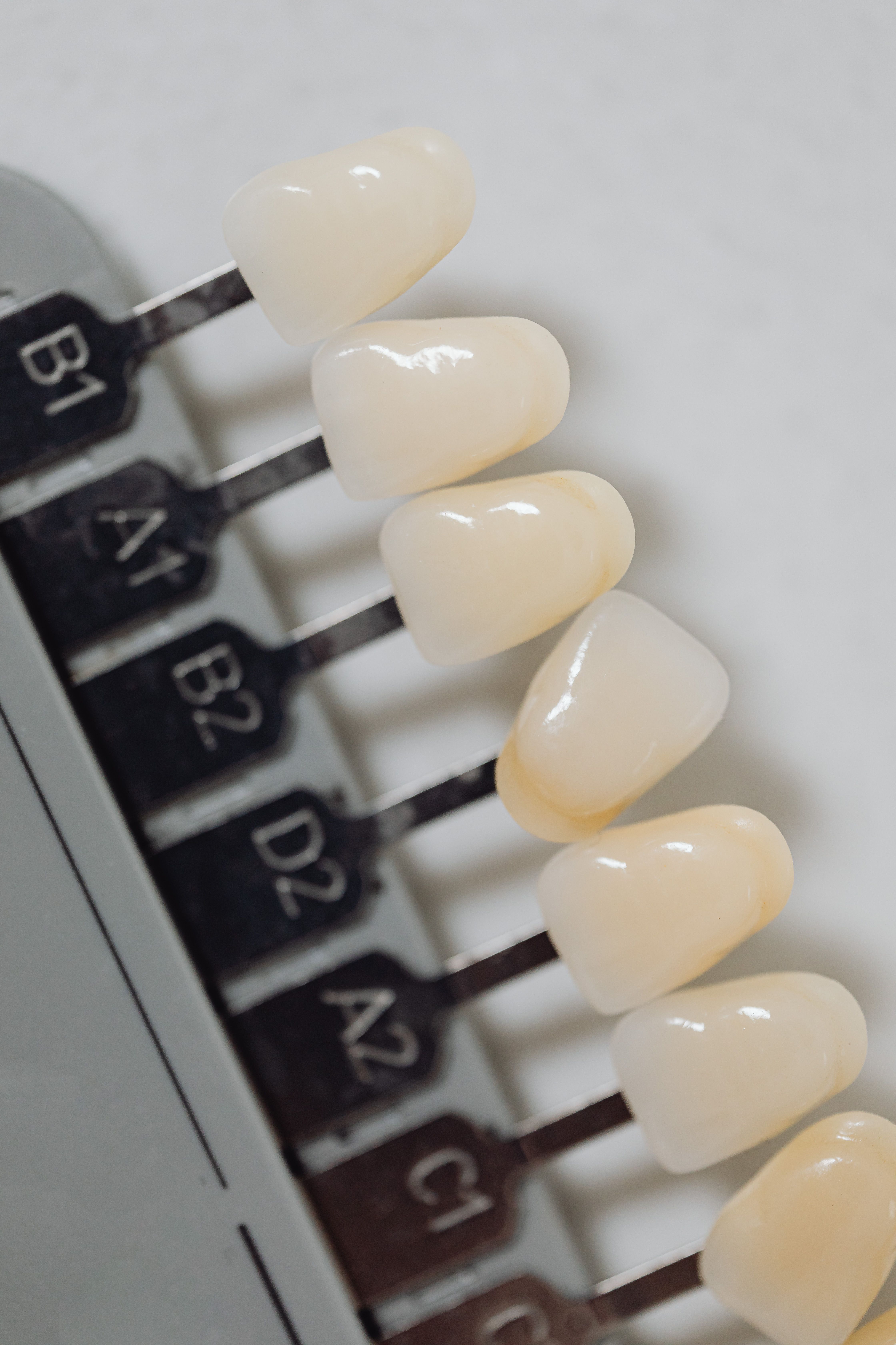 Photo Dental Shade Guide Displaying Tooth Color Samples Closeup